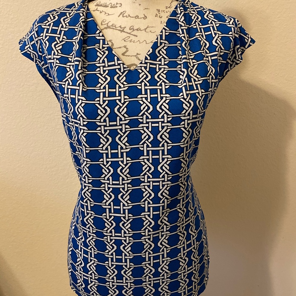 Sleeveless blue and black blouse